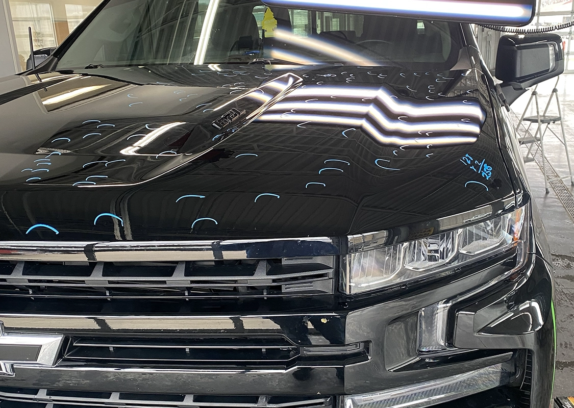 IMG_6060-wide Vehicle undergoing professional paintless dent repair at Precision PDR in Denver