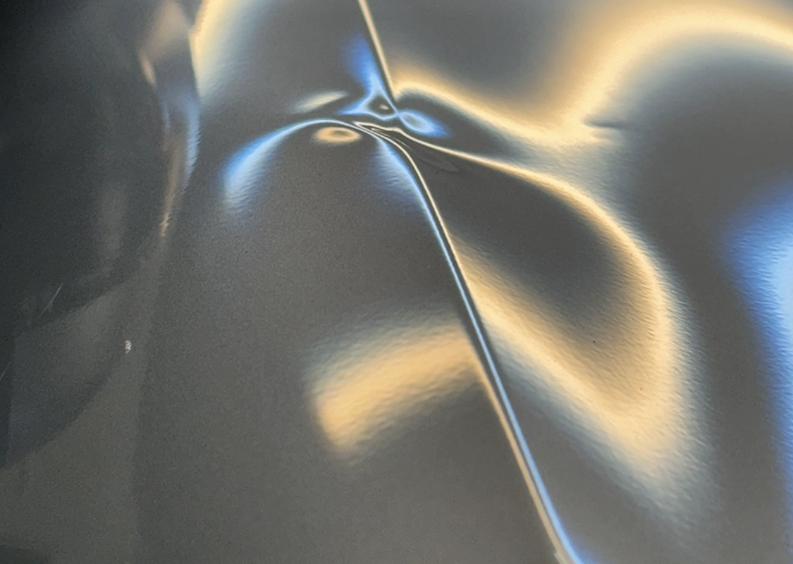 Professional paintless dent repair service for vehicle damage at Precision PDR