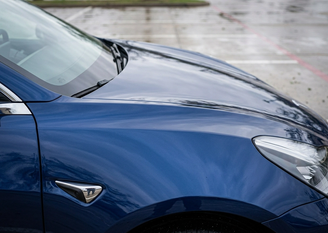 Professional paintless dent repair service for vehicle damage at Precision PDR